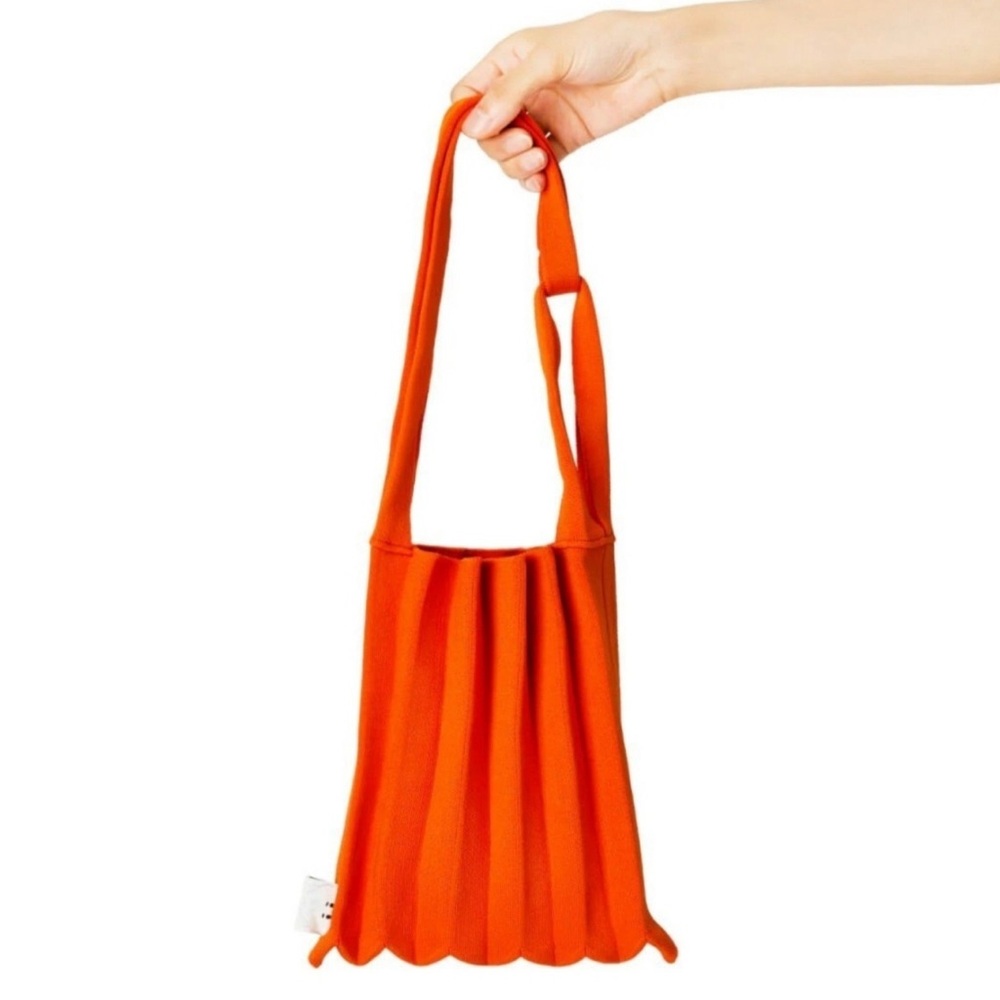 Bt21 LINE FRIENDS NWT orange pleat bag